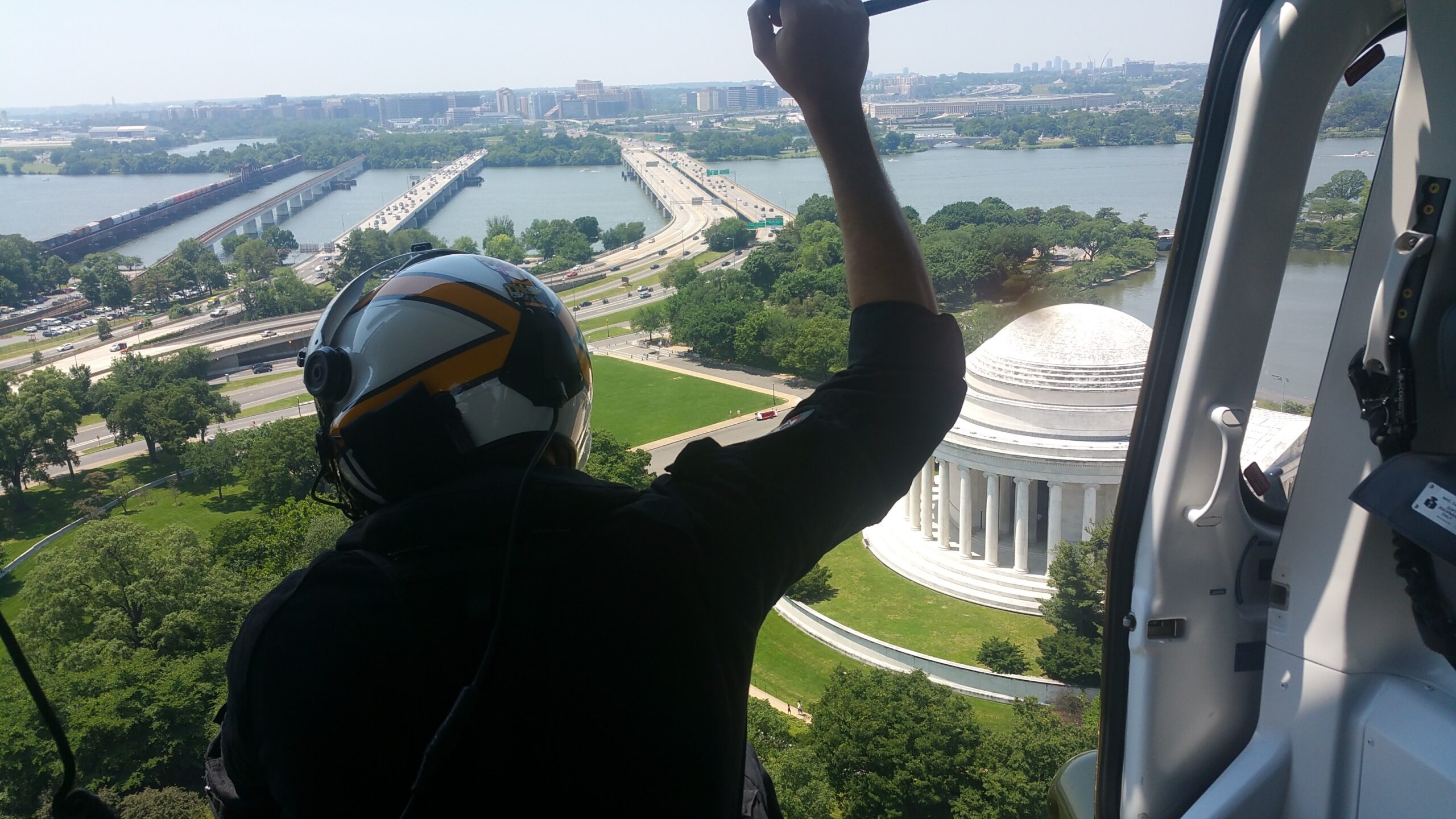Ed Strapp, ATC Ed Strapp hangs on as he flies over Washington, DC in a helicopter