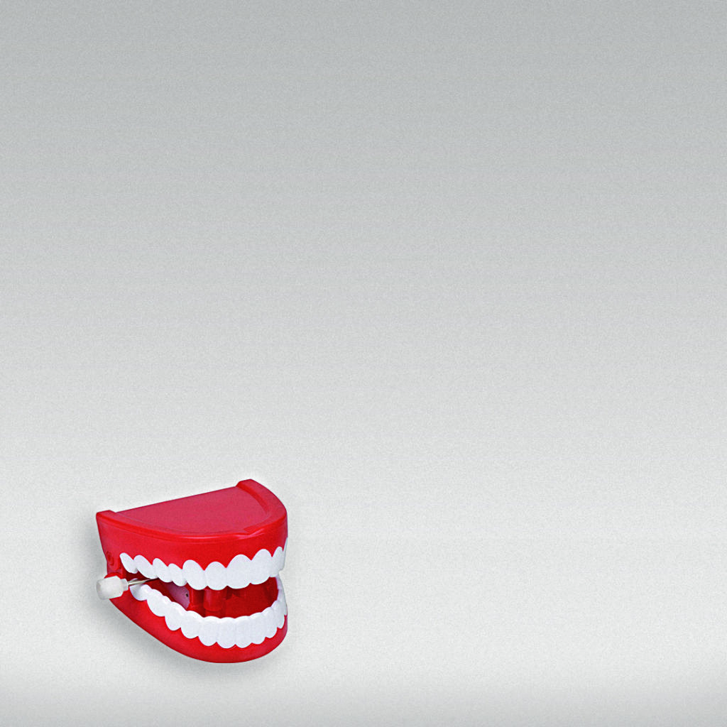 teeth chattering in square tile. Used to illustrate a dental injury