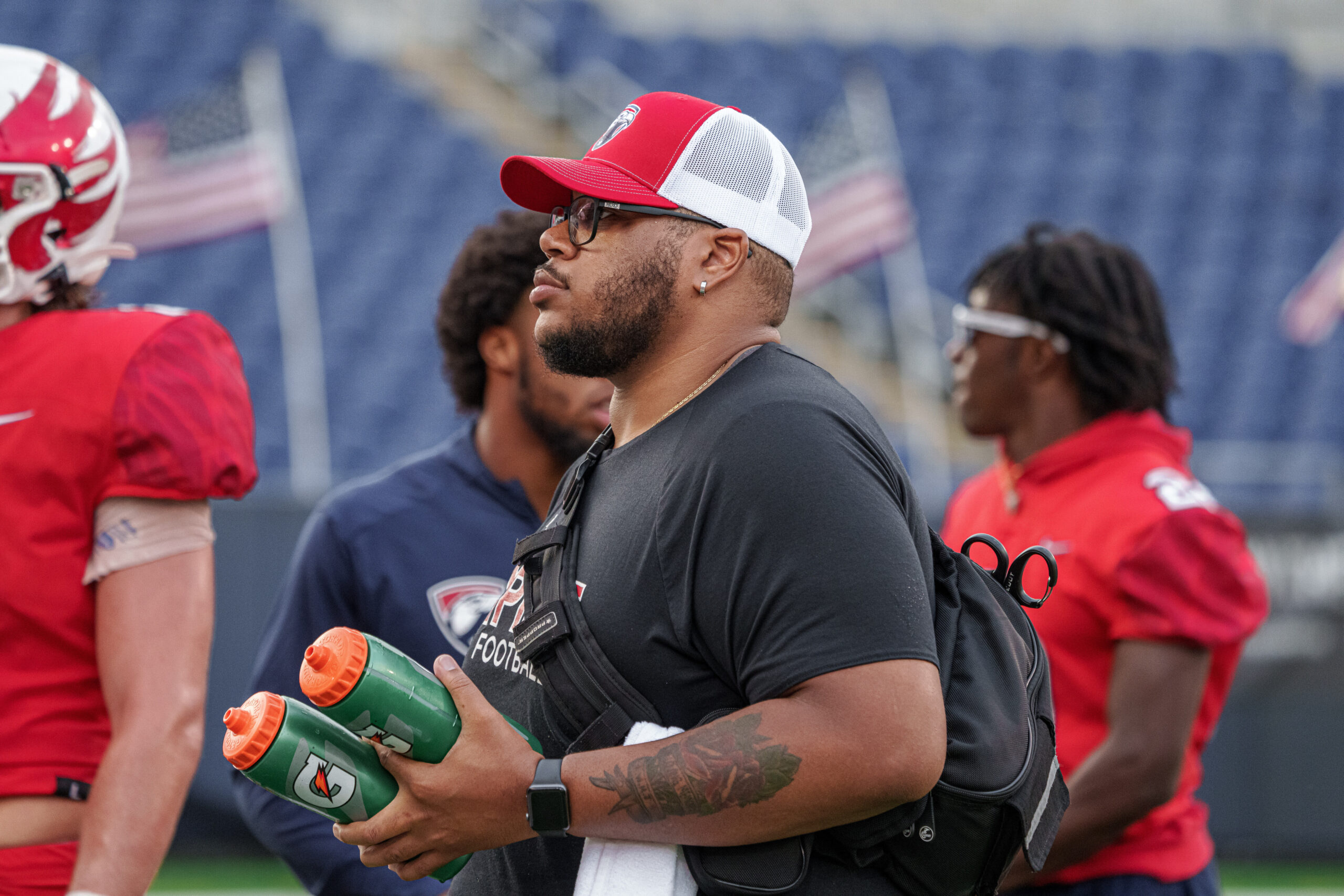 Athletic Trainer Aaron Jackson monitors the sideline with his football program in Georgia. 